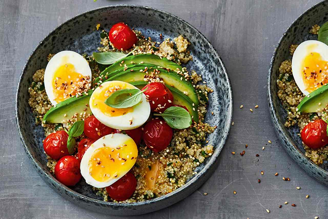 Hearty Quinoa Porridge with Avocado, Cherry Tomatoes and Eggs