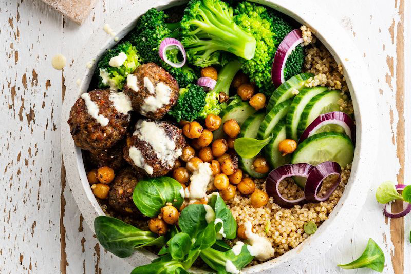 Scrumptious bowl of quinoa with falafels and crispy chickpeas